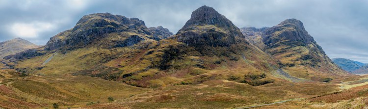 a view of three rocky outcrops.